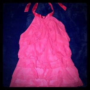 Pink halter. Flowy material. Med-juniors likely